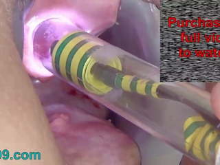 Endoscope camera into peehole woman pee hole playing.